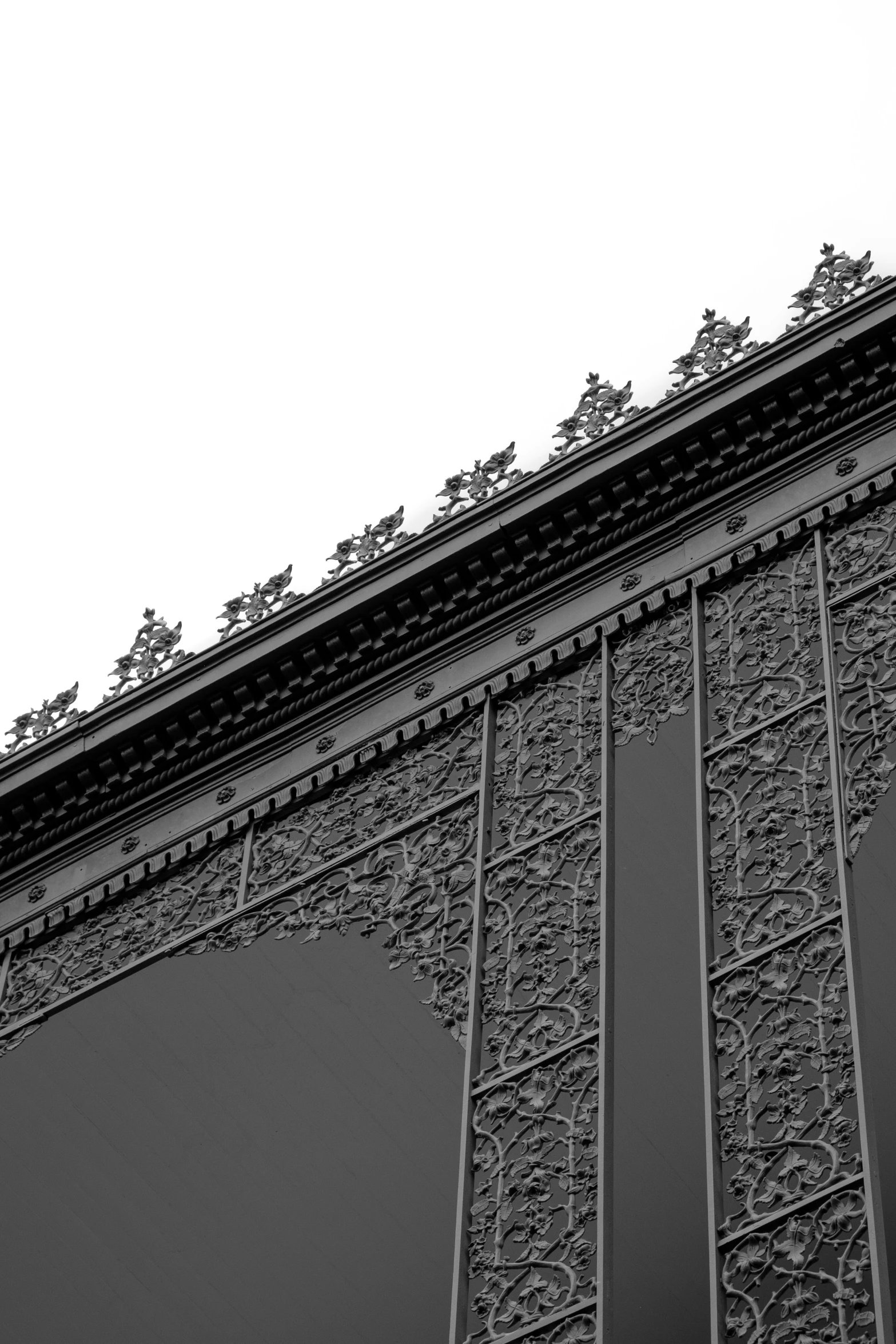 a black and white po of the top part of an oriental building