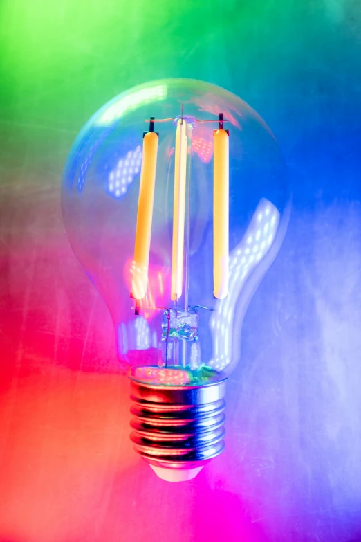 a multicolored light bulb with the bottom turned down