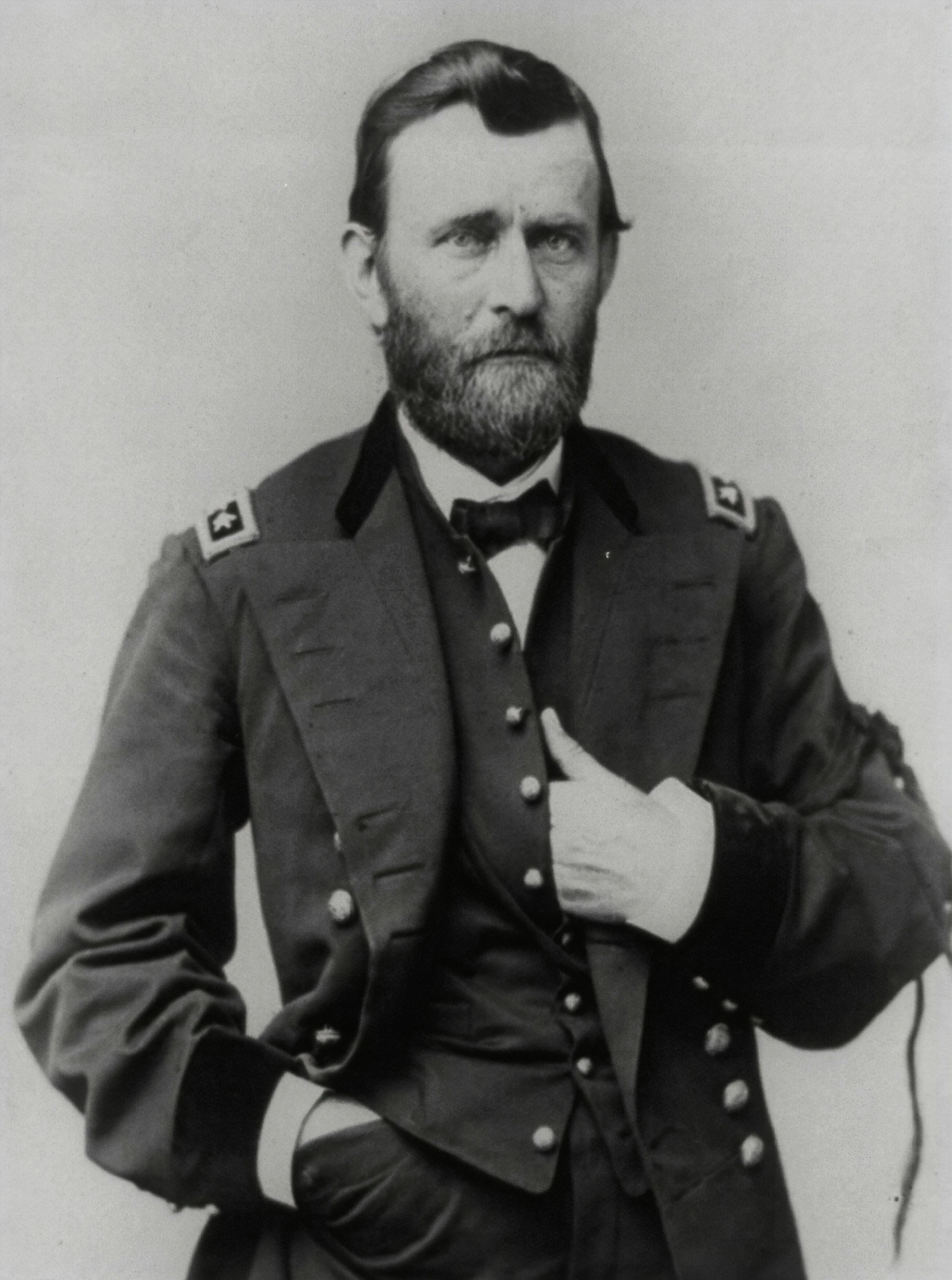 an old black and white po of a man in a uniform