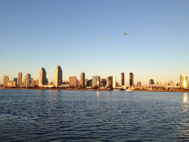 a picture from the ocean looking at the skyline