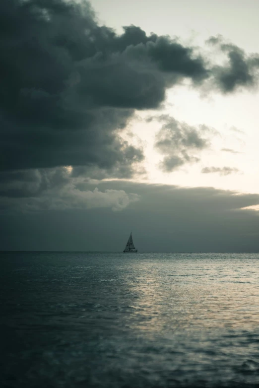 boat out on the water, under cloudy skies