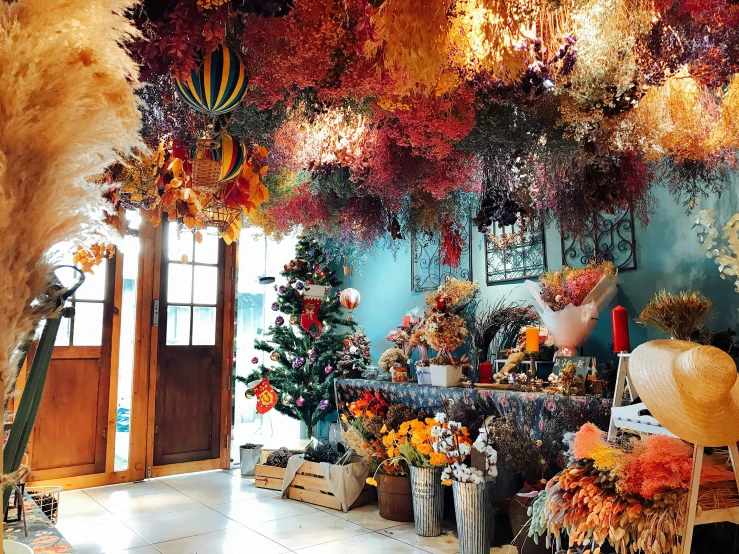 the top of a hanging ceiling with an assortment of flowers