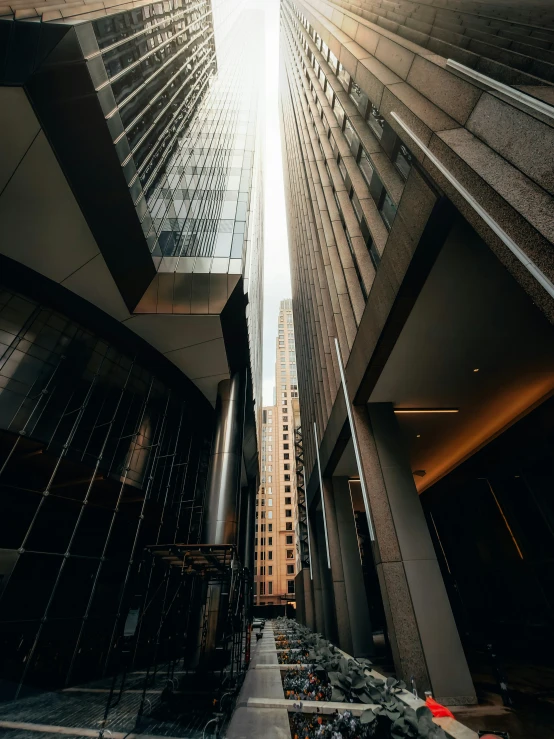 a large tall building sitting next to a sidewalk