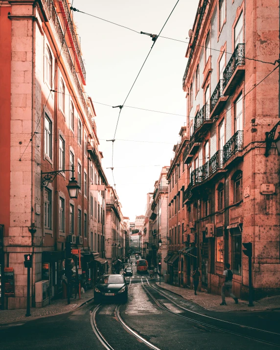 this street is full of people and cars