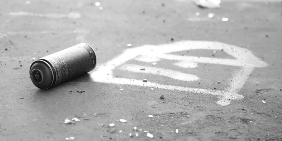 a can is on the ground near the ground