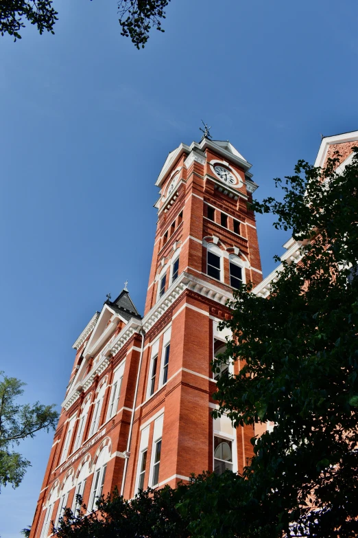 a tower building that has a clock on it