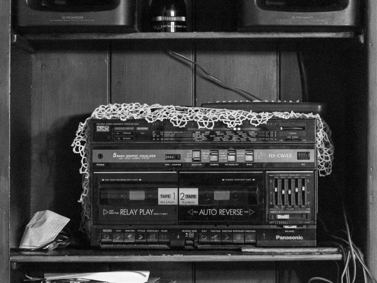 a black and white po of some equipment on a shelf