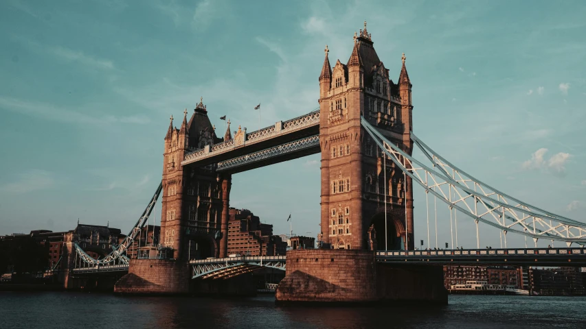 a tall bridge with many towers and wires