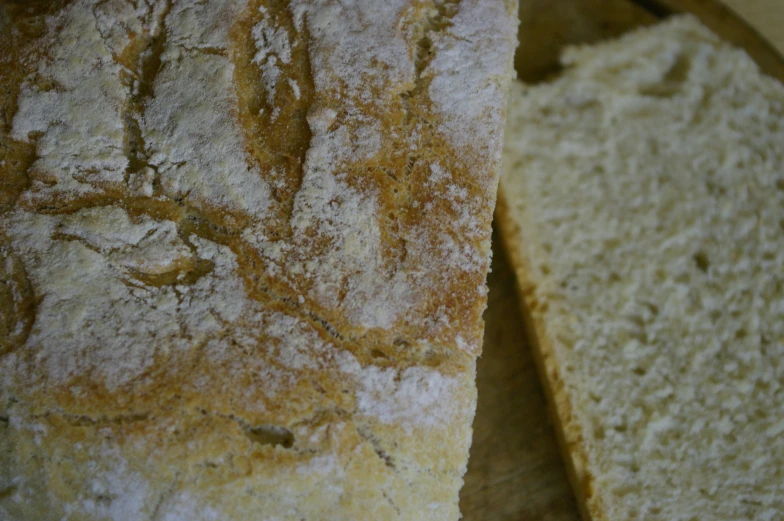 a piece of bread sitting on top of a  board