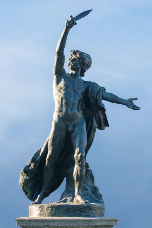 a statue is shown with a bird flying near it