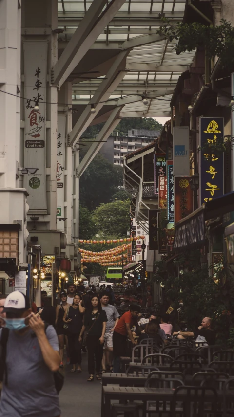 a woman is taking a picture in the city