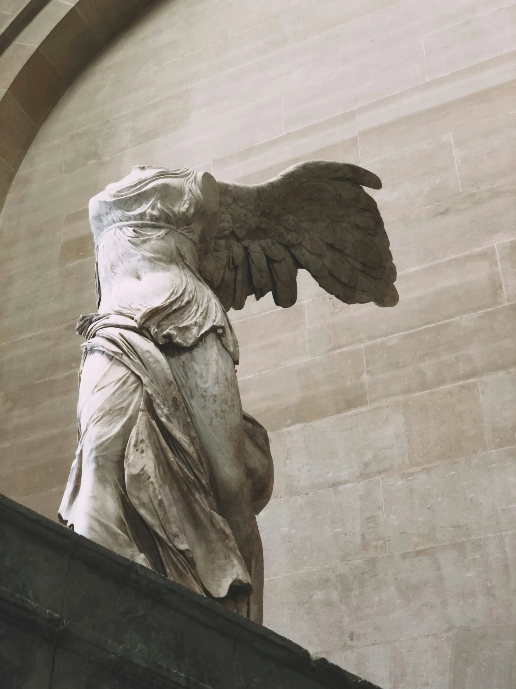 a very large statue with an angel on it