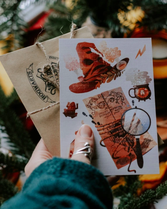 someone is holding some christmas cards from an assortment