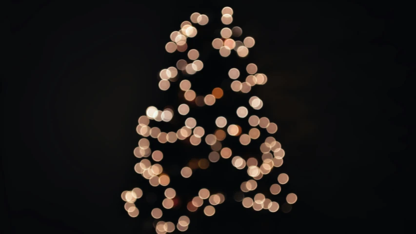 blurry lights in the shape of a christmas tree