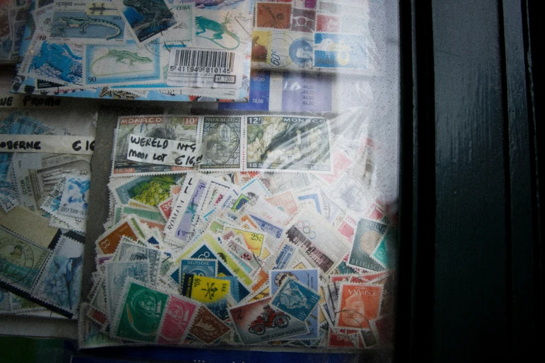 the window is decorated with many different colorful papers