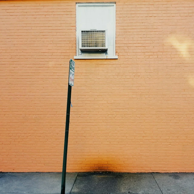 a building with an air conditioner attached to it