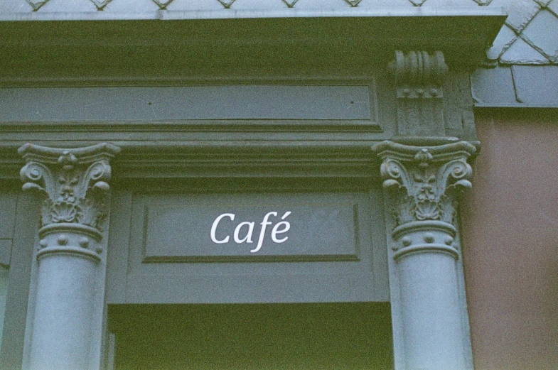 the logo for a restaurant called cafe
