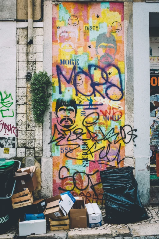 a brightly colored wall with writing on it