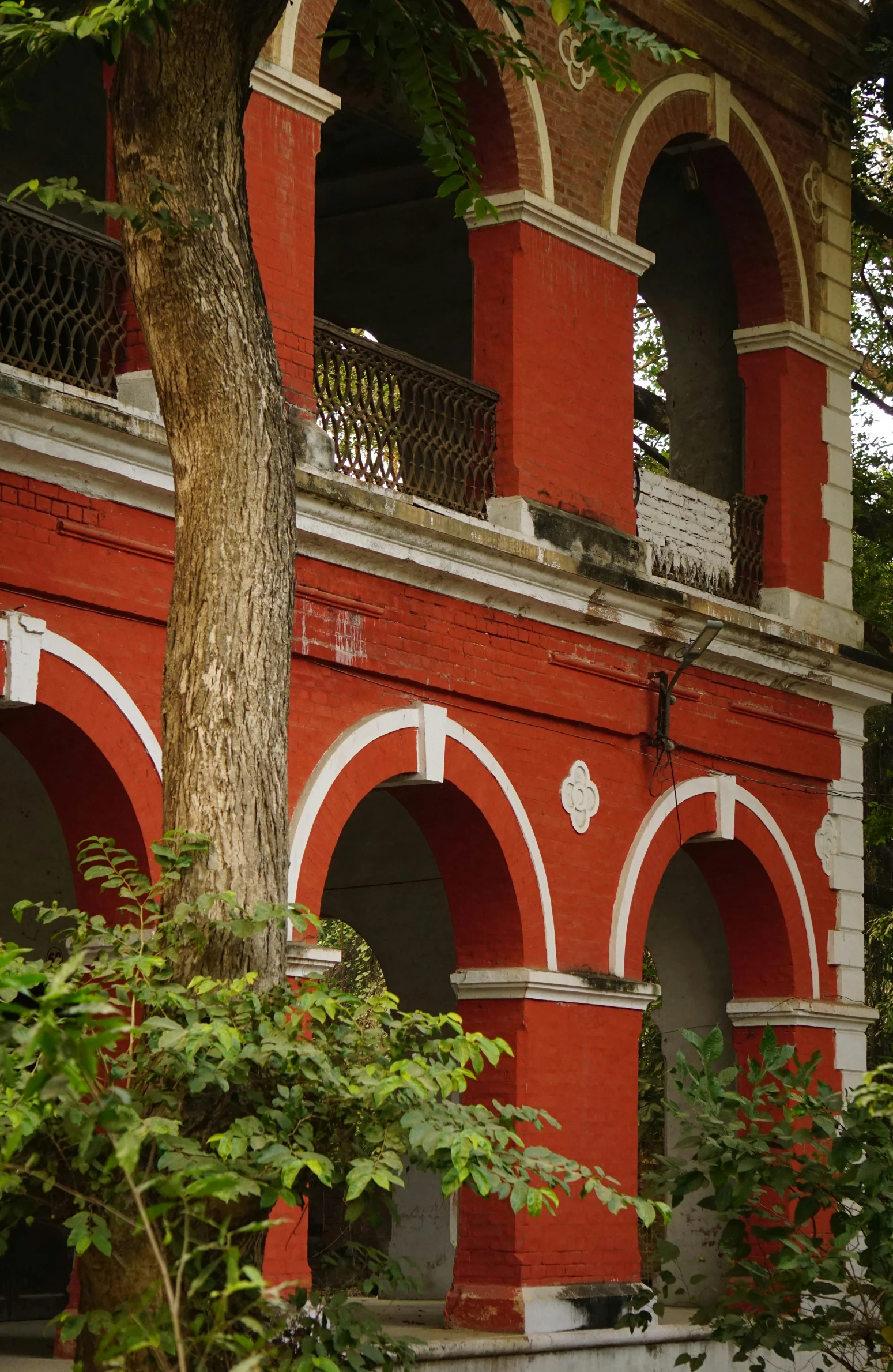 there is a tall red and white building