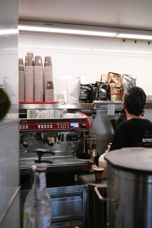 a chef preparing food in the kitchen at a restaurant