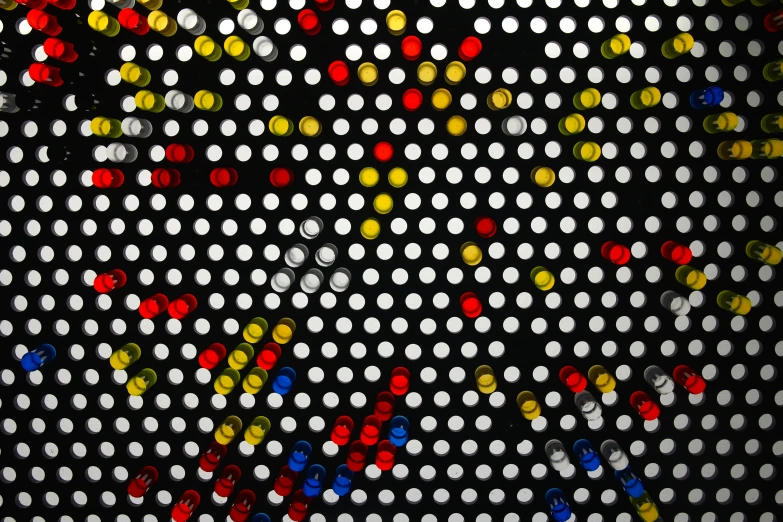 an abstract pattern made up of various colored objects