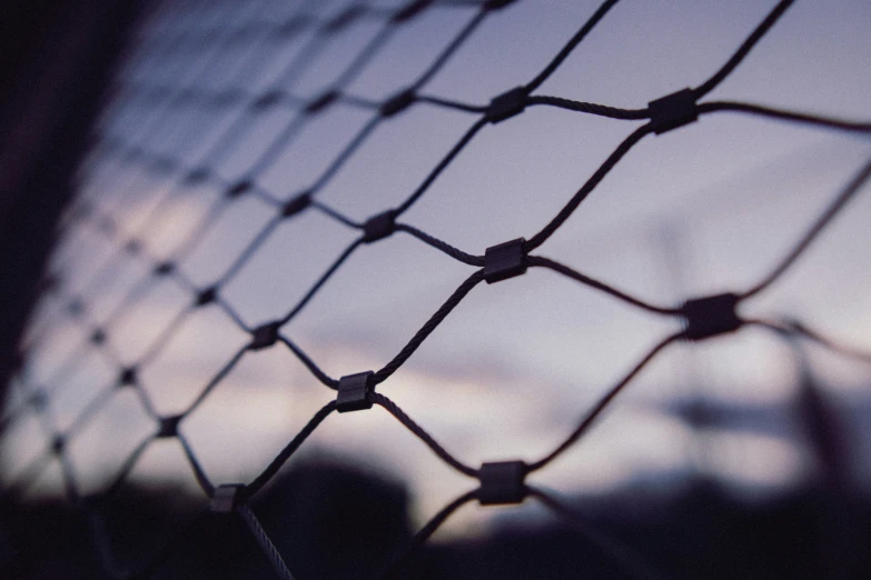 the fence is mesh and wire as seen from inside