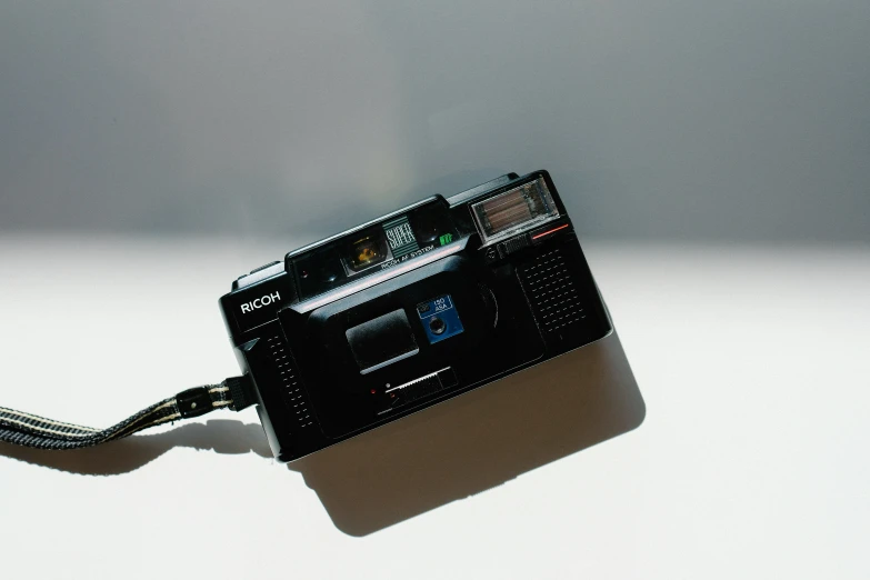 a close up of a radio attached to a cord