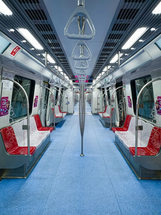 a long train with lots of red and white seats