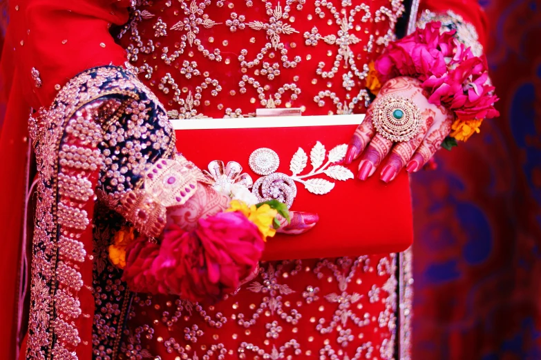 an oriental - american woman in red holding her purse