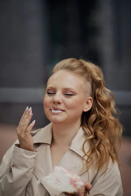 young blonde woman with blond hair smoking cigarette