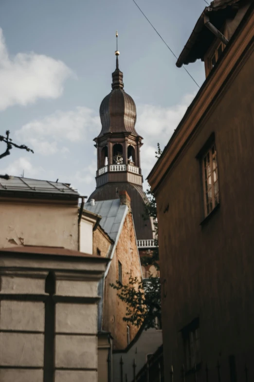 a tower and other buildings near one another