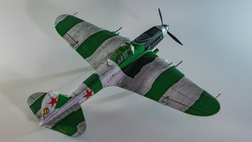 a model of a plane with four blades