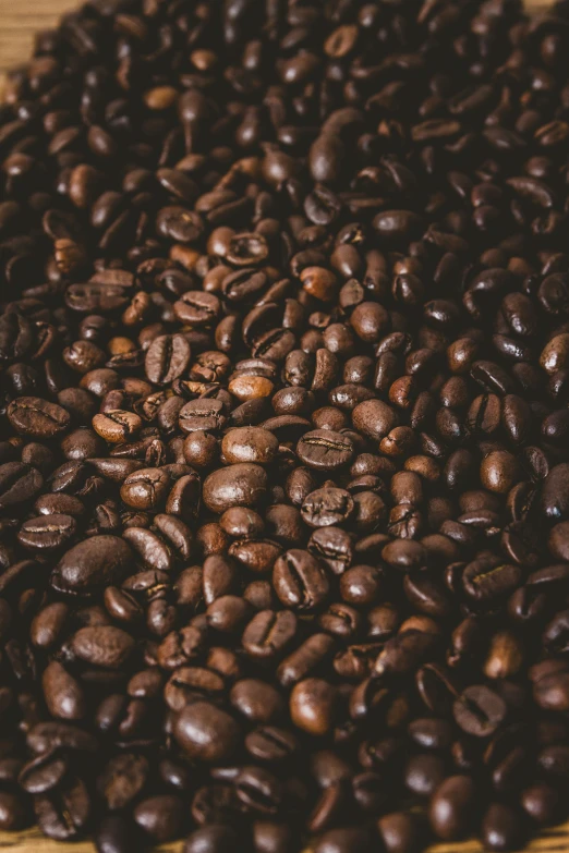 coffee beans piled up on a table top