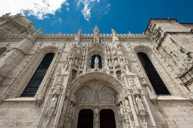 large white church with blue sky in background