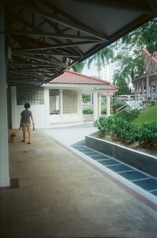 a person is walking down the hall way