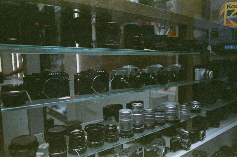 there are many jars and items on the shelves