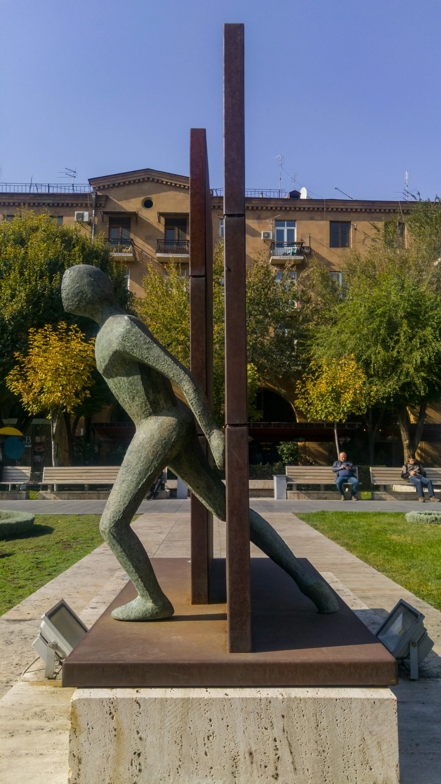 a sculpture is shown in front of a building