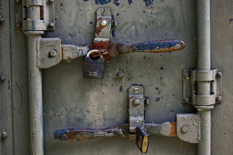 an old iron gate that has been painted rusted