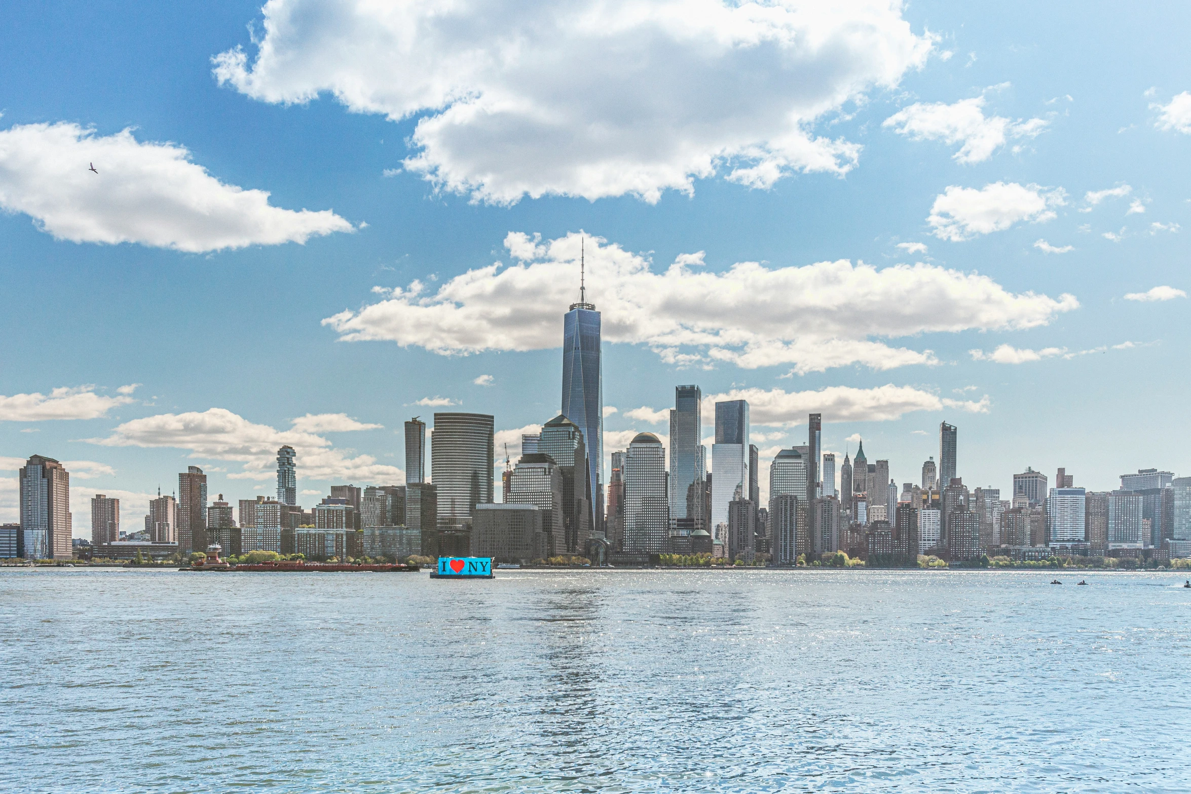 an image of a city skyline overlooking a river