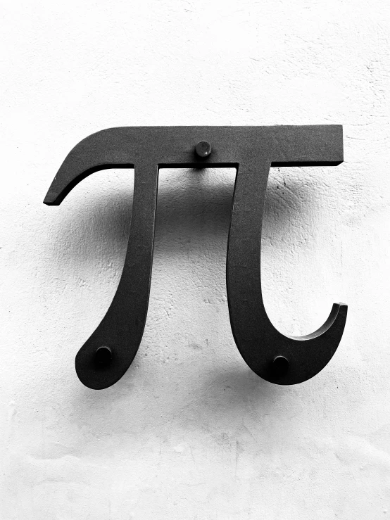 a black and white po of an pi symbol