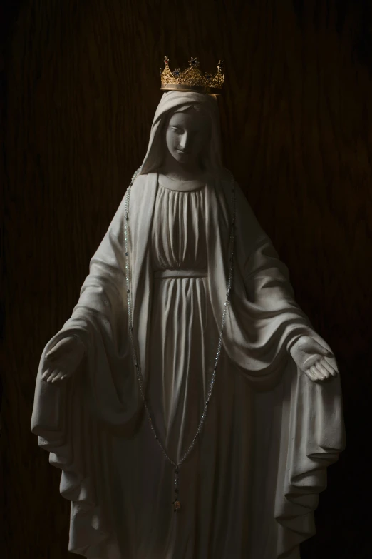 this statue is of the virgin mary