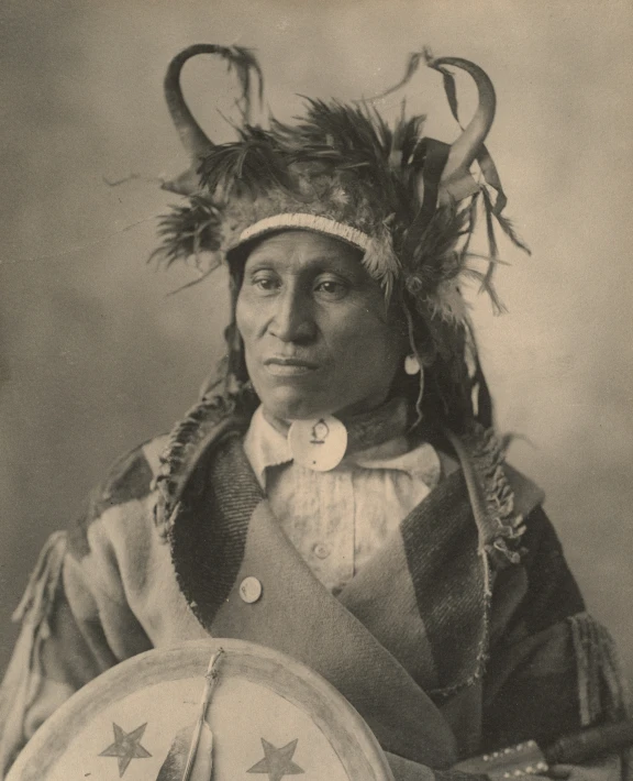 an old po of a native american woman with stars