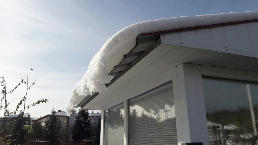 a building is covered in snow and ice