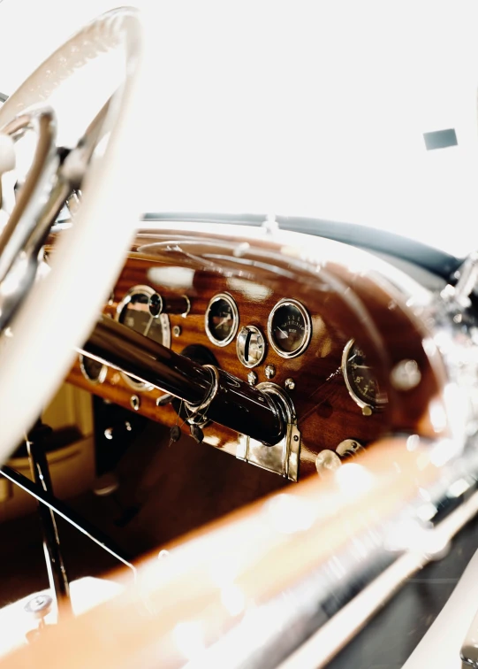 the interior of an old car with many gauges
