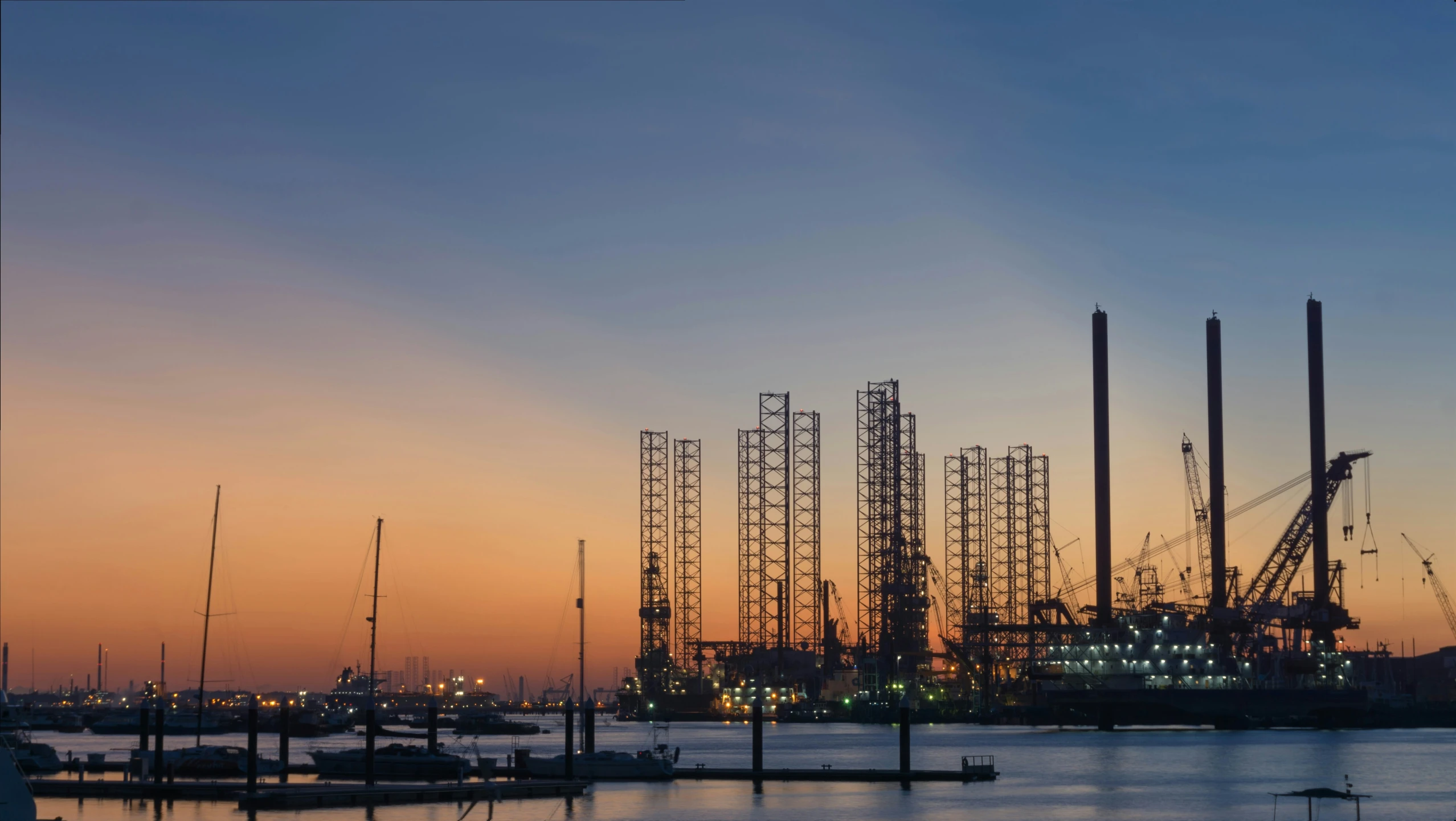 a view of a harbor with many ships