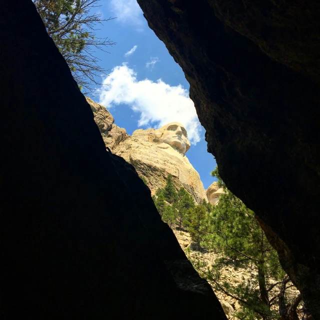 view looking through opening to sky in distance