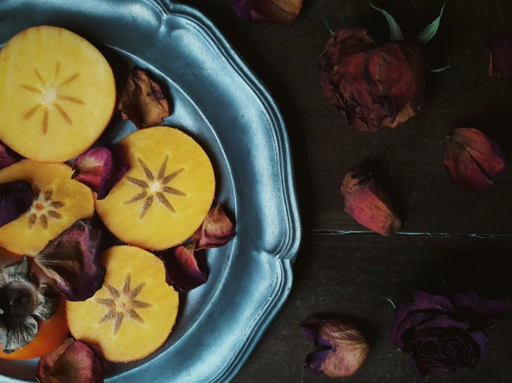 there are several sliced up pieces of fruit in the bowl