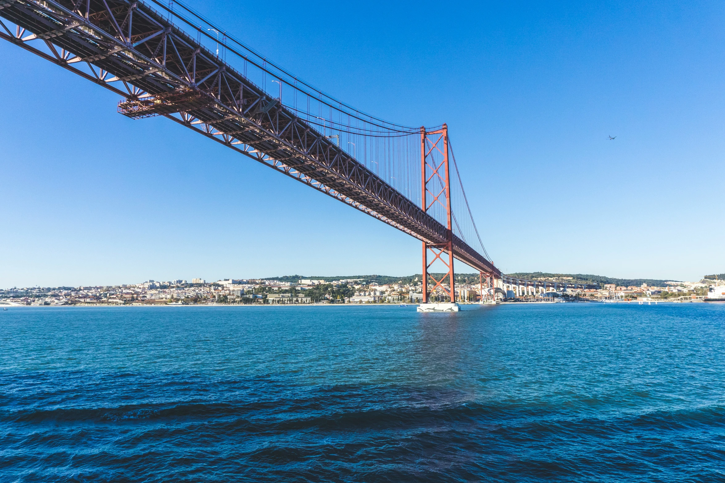 a bridge spanning the width of a body of water