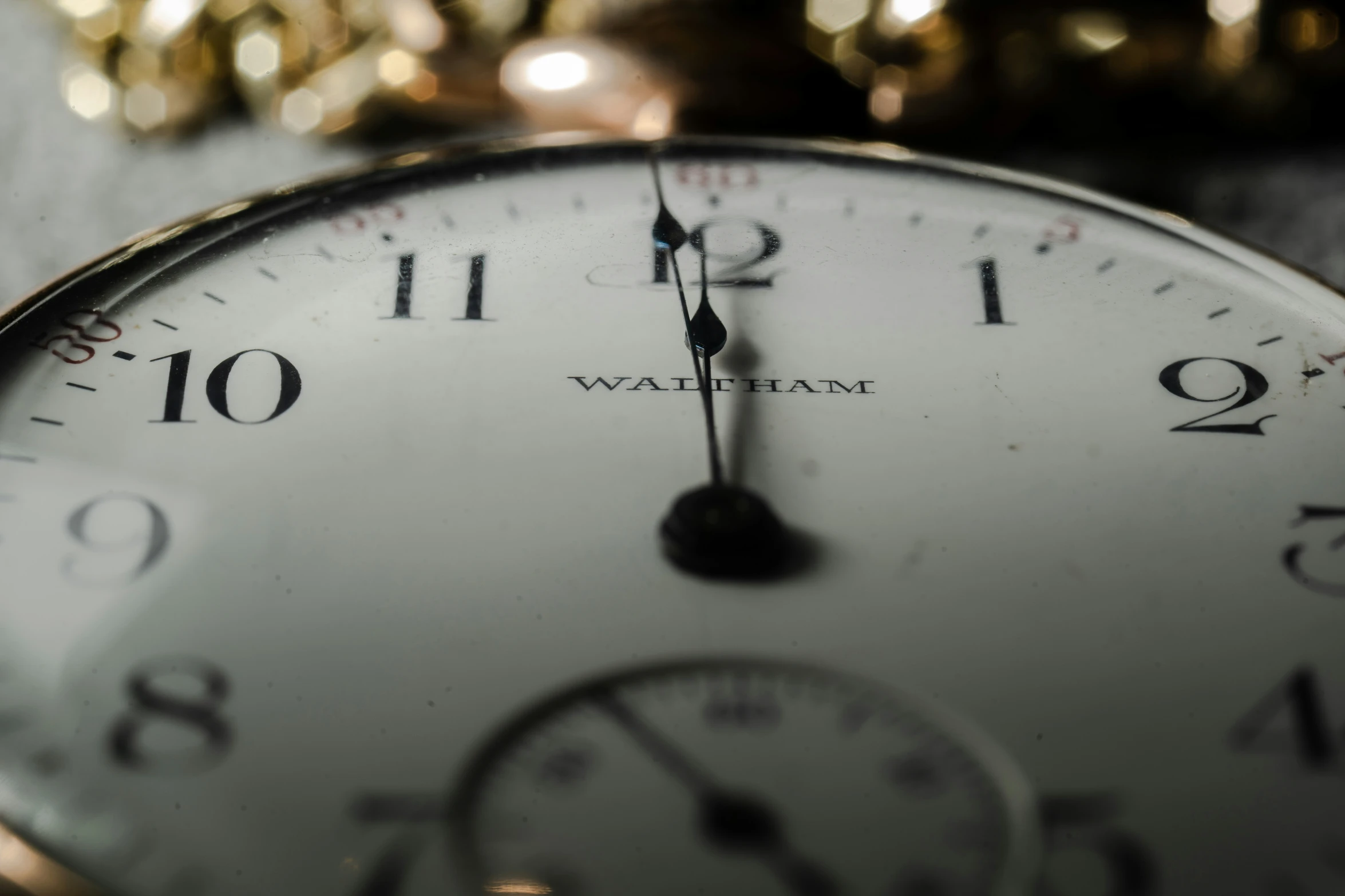 a closeup view of a pocket watch face