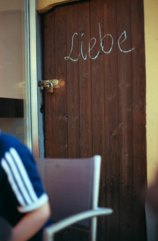 an image of door with writing on it
